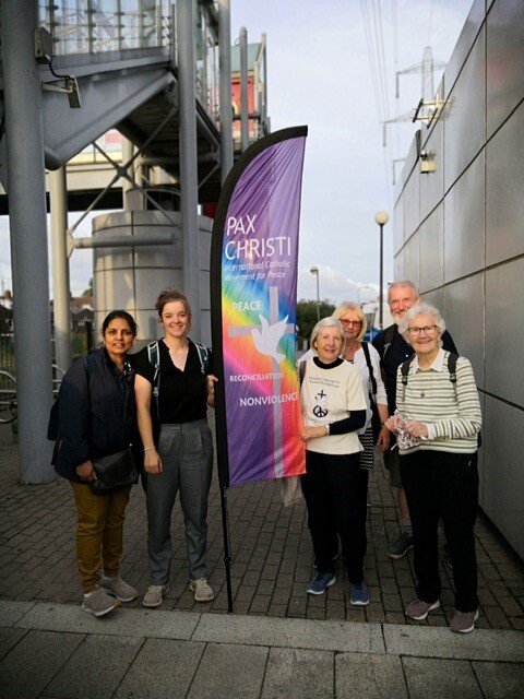People with Pax Christi Banner